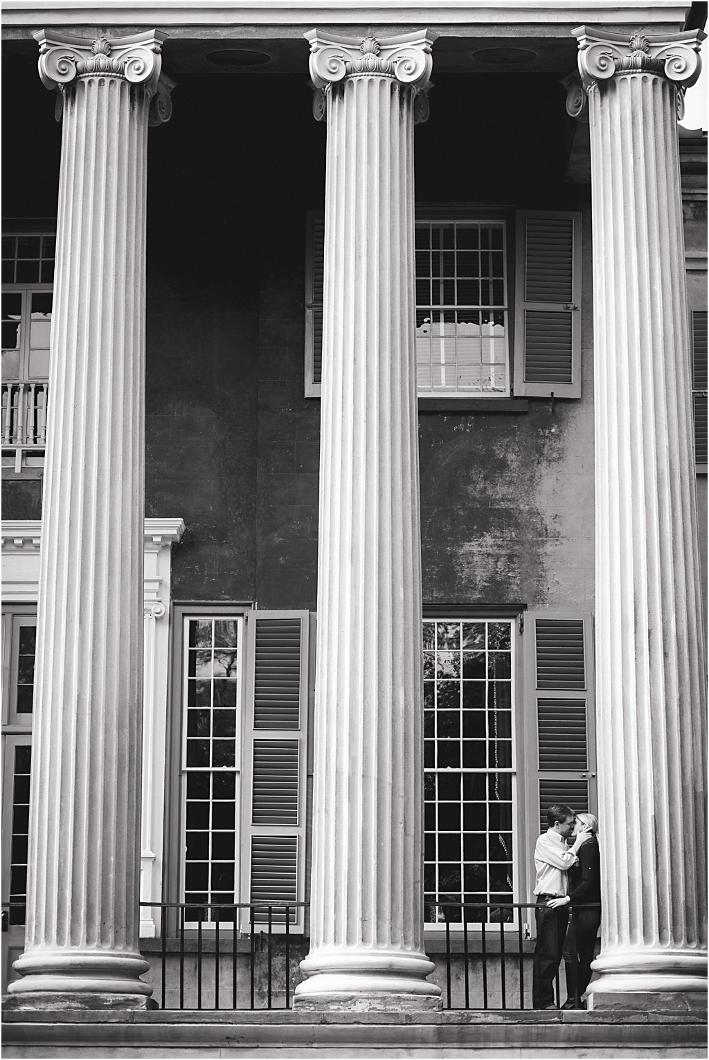 black and white photo of bride and groom at the college of charleston