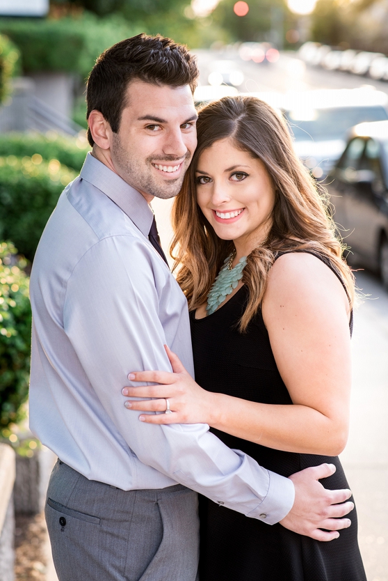 Photo of smiling couple in downtown Clayton engagement session 