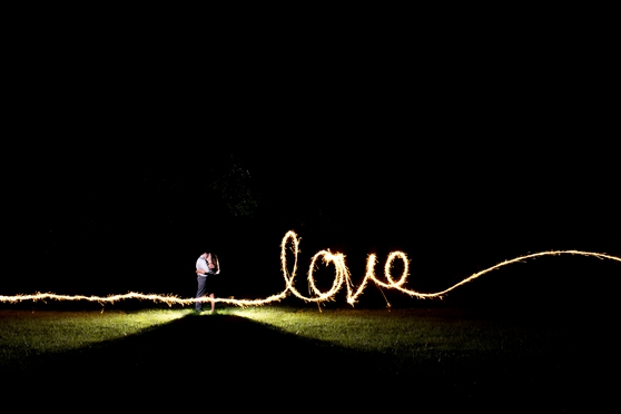 Photo of love sparkler writing