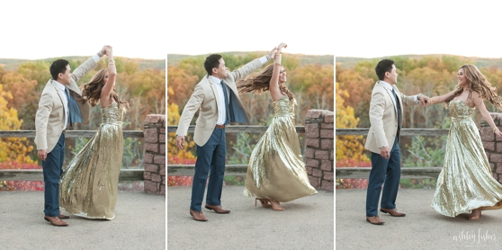 Photo of couple dancing outdoors surrounded by the fall trees at Johnson Shut Ins