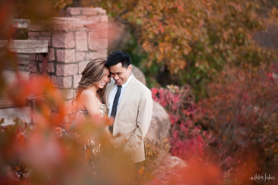 Photo of couple surrounded by beautiful fall colors at Johnson Shut Ins
