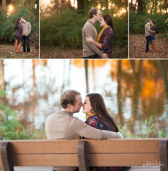 Photo of couple kissing by pond at fall engagement session