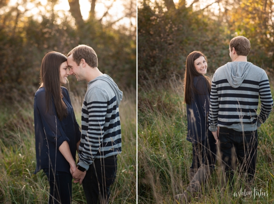 Photo of couple walking in tall grass of field at fall engagement session