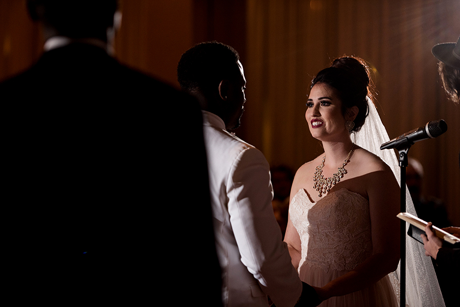 bride during ceremony at NEO by Ashley Fisher Photography