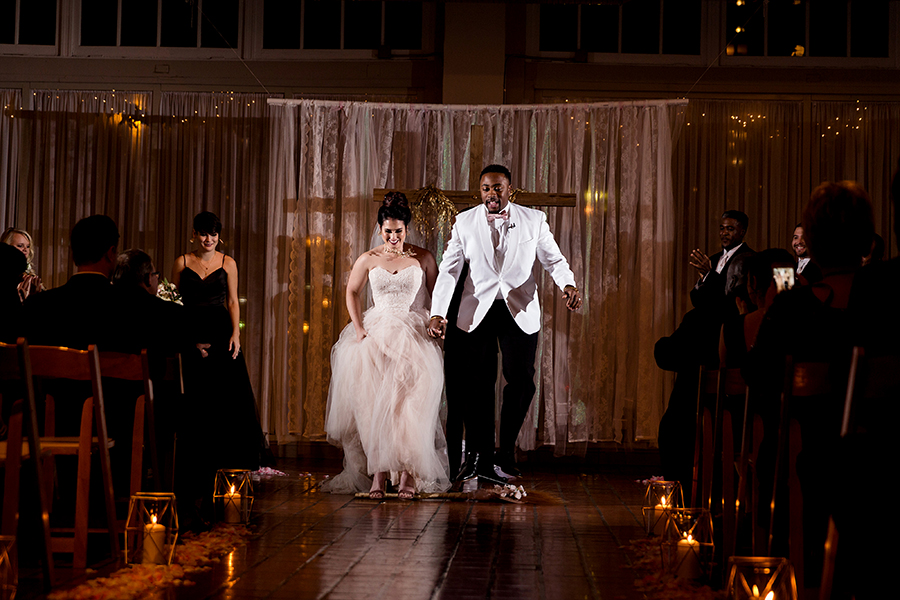 jumping the broom at NEO by Ashley Fisher Photography