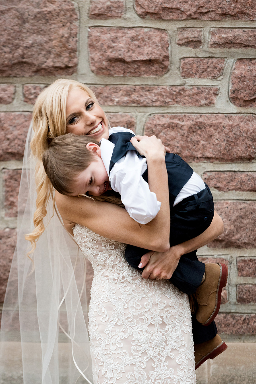 bride and ring bearer for a winter wedding at graham chapel by ashley fisher photography