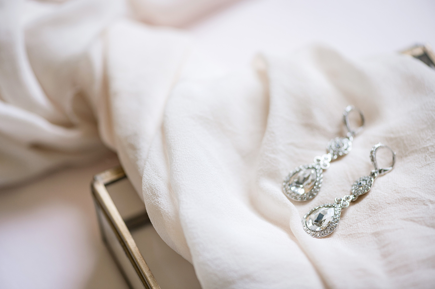 photo of wedding earrings by ashley fisher photography