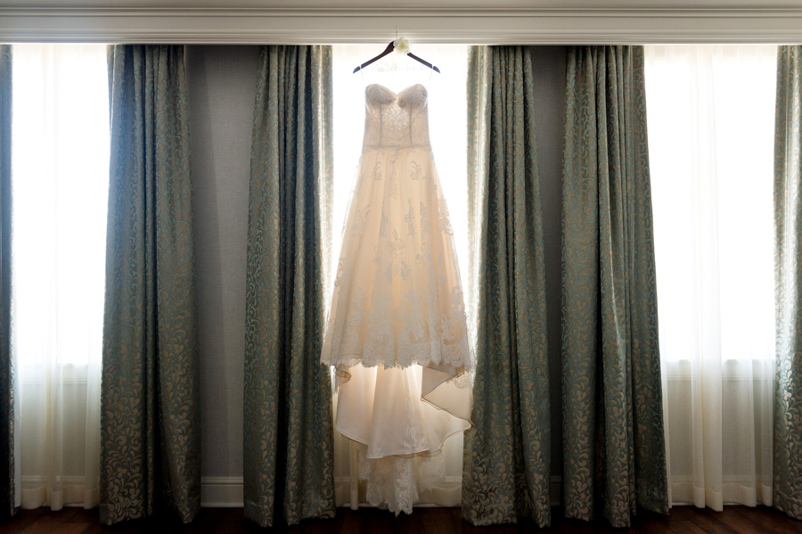 photo of wedding dress hanging at union station by ashley fisher photography