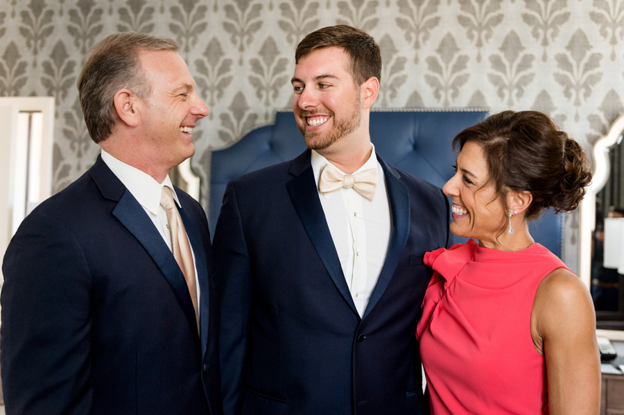 photo of groom with his parents at union station by ashley fisher photography
