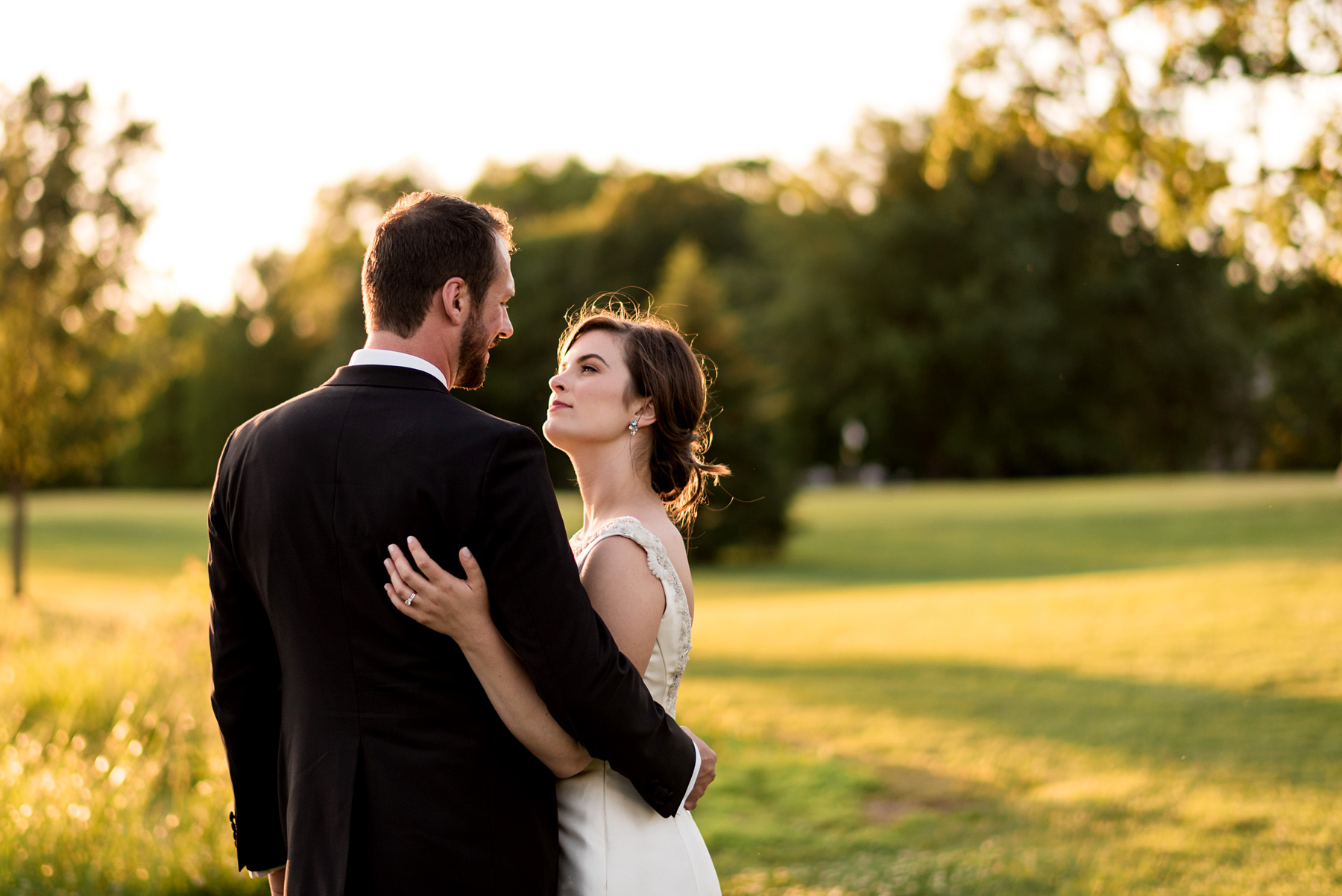 photo of bride and groom at sunset at missouri history museum by ashley fisher photography
