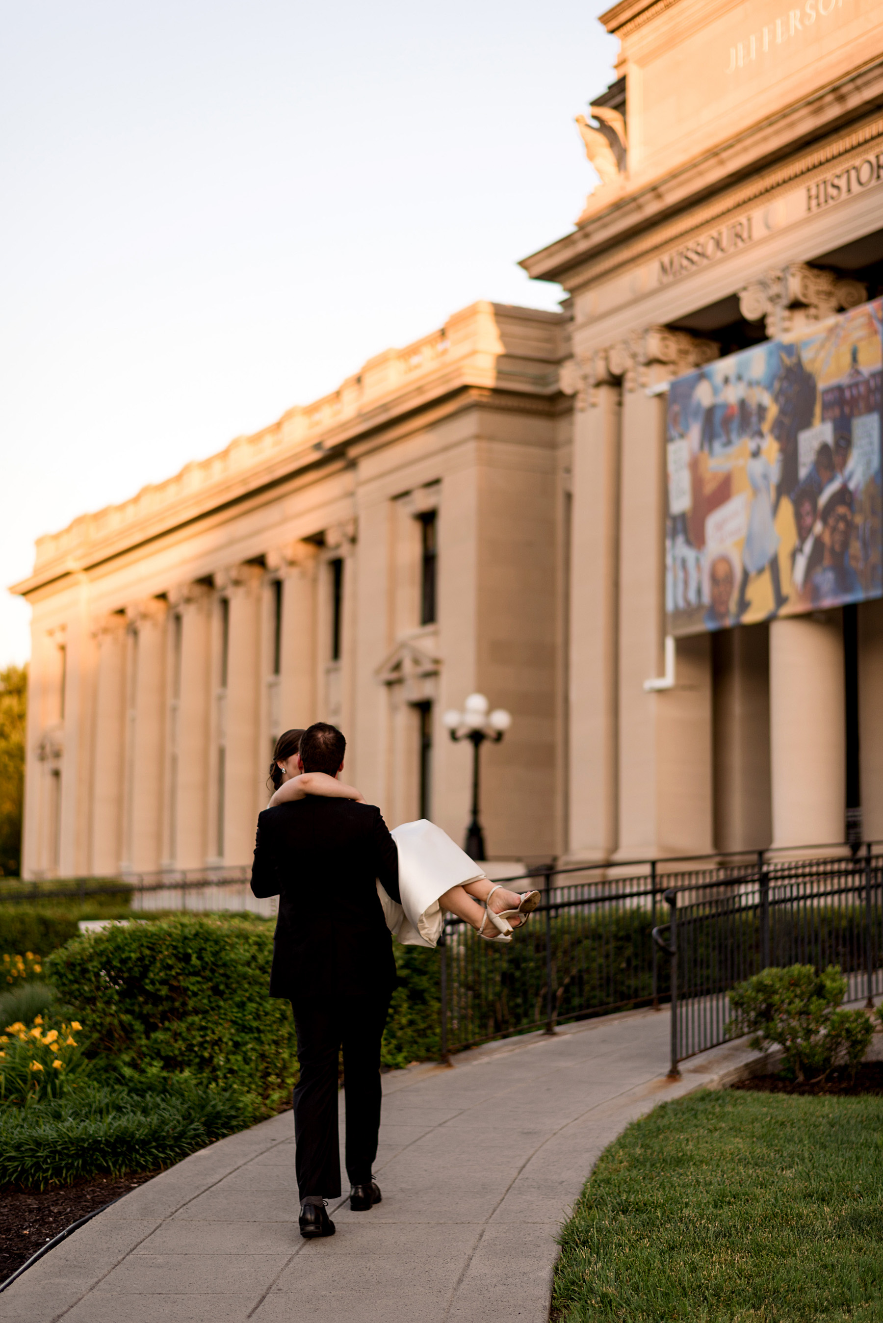 photo of bride and groom at sunset at missouri history museum by ashley fisher photography