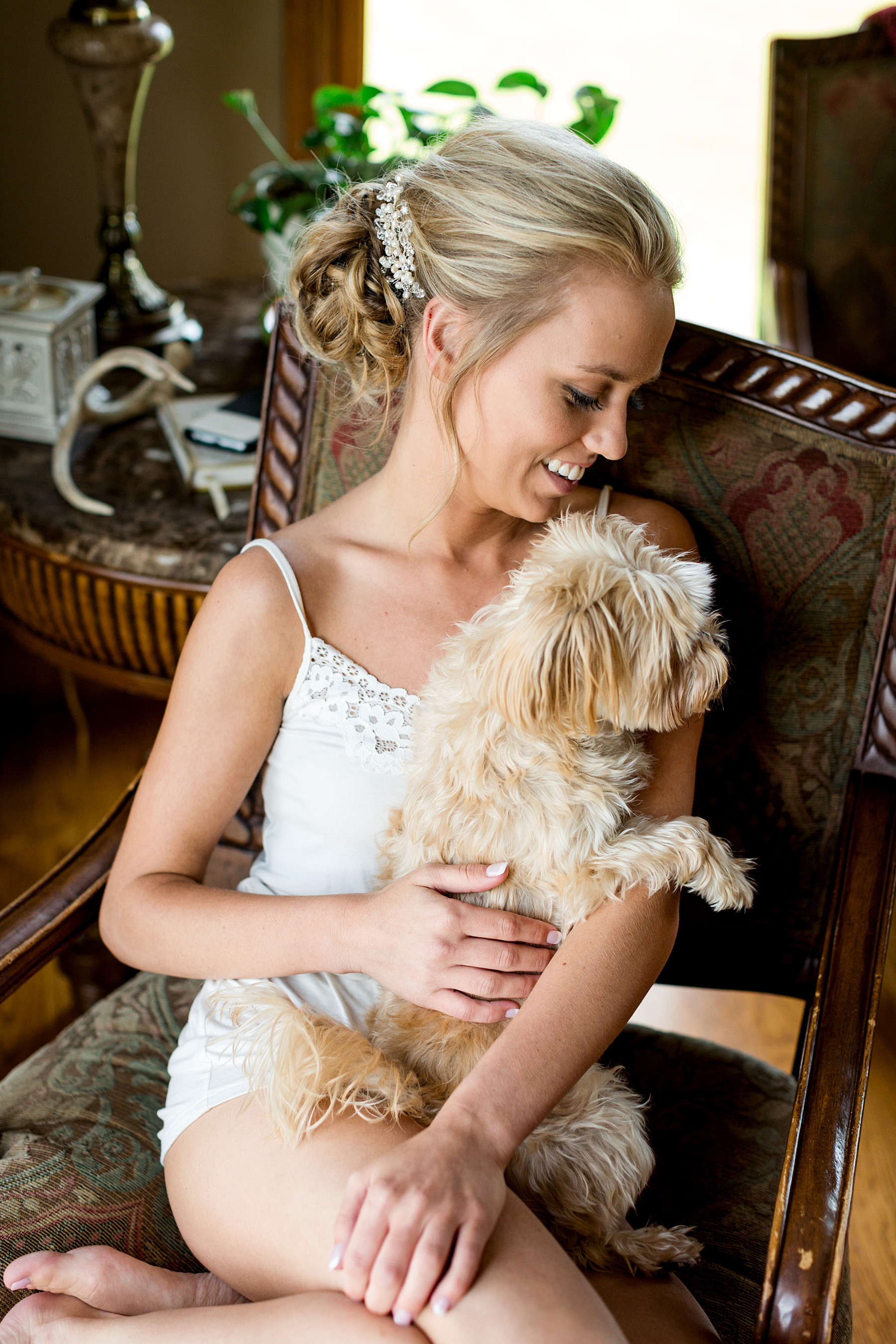 photo of bride with dog by ashley fisher photography