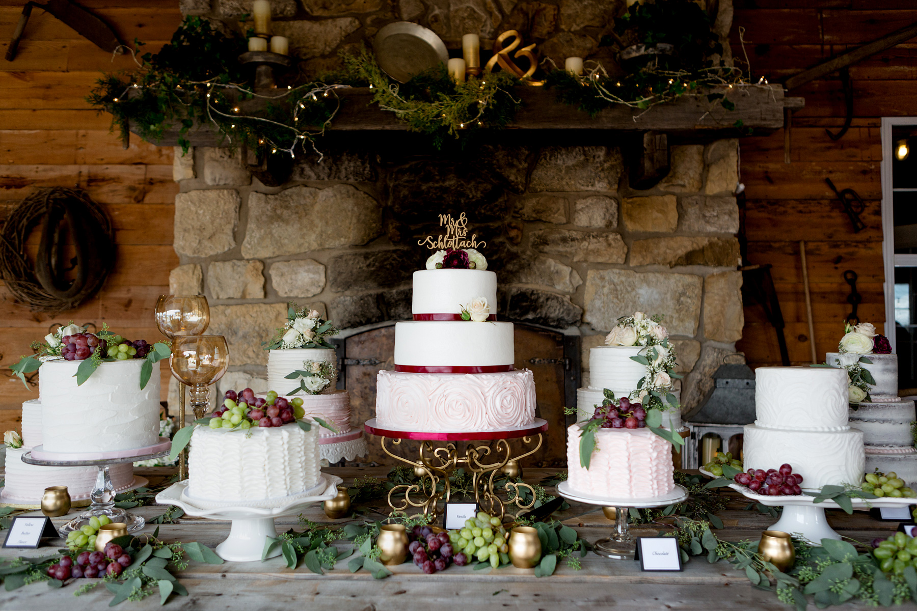 photo of 7 wedding cake display at white mule winery by ashley fisher photography