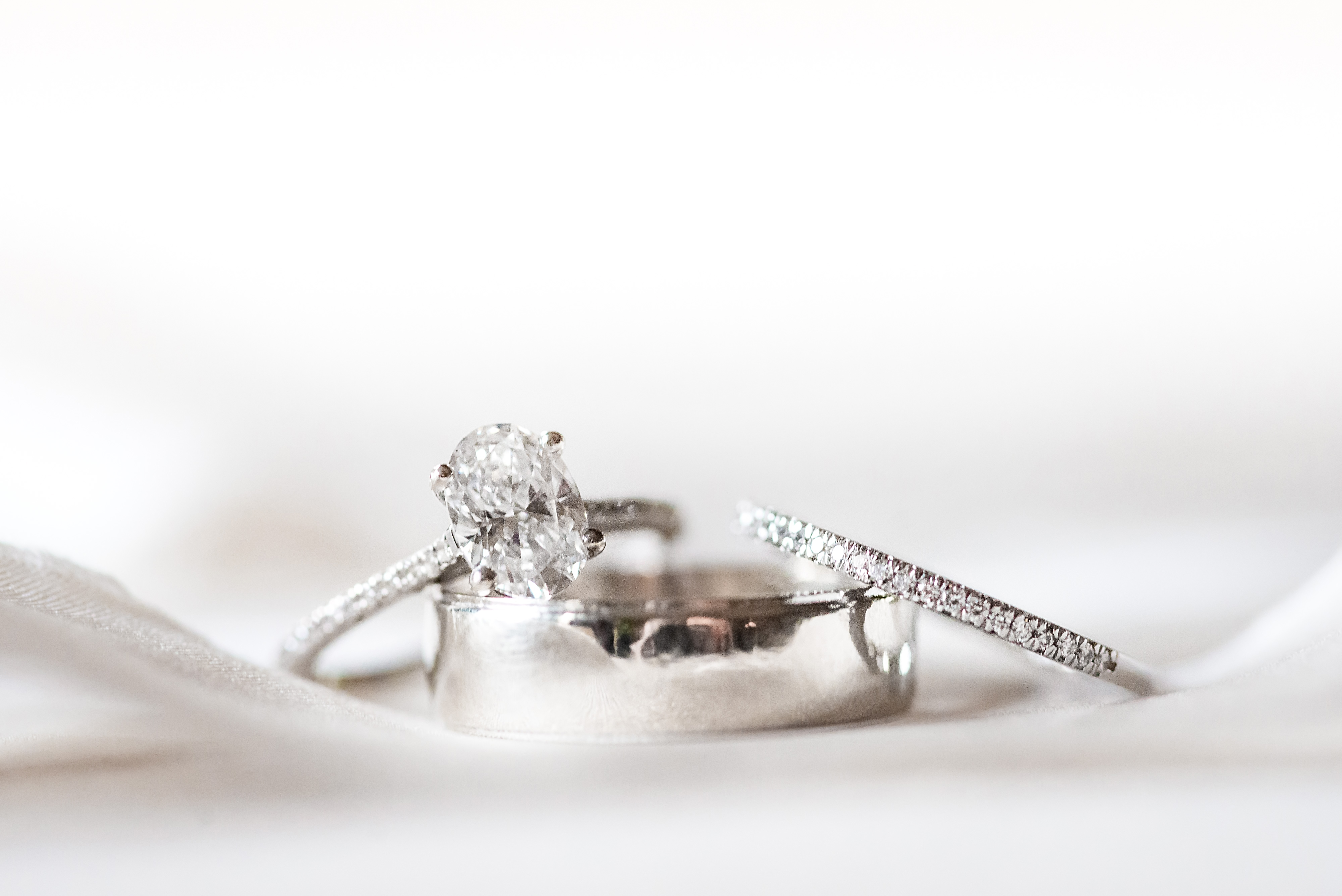 oval engagement ring with pave band by ashley fisher photography