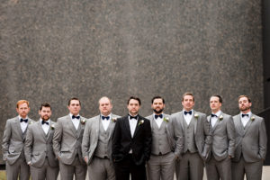 photo of the groomsmen at the art museum by ashley fisher photography