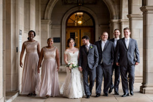 photo of bridal party at wash u on rainy day by ashley fisher photography