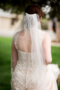photo of back of bride's dress by ashley fisher photography