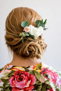 photo of beautiful bridal hair style with fresh flowers by ashley fisher photography