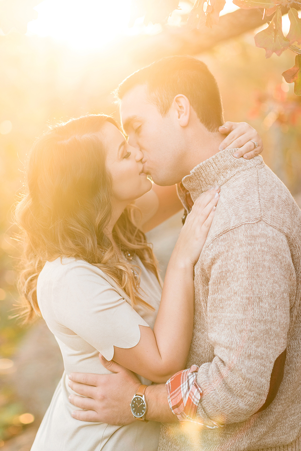 sundrenched kiss at elephant rock engagement session