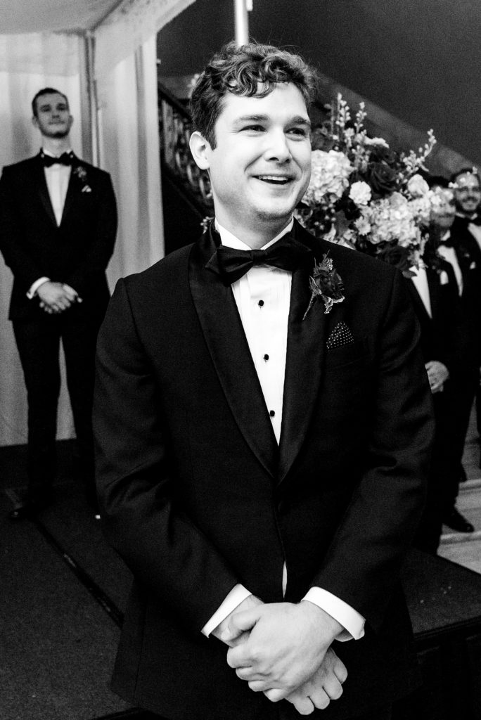 groom's reaction to seeing bride walking down the aisle