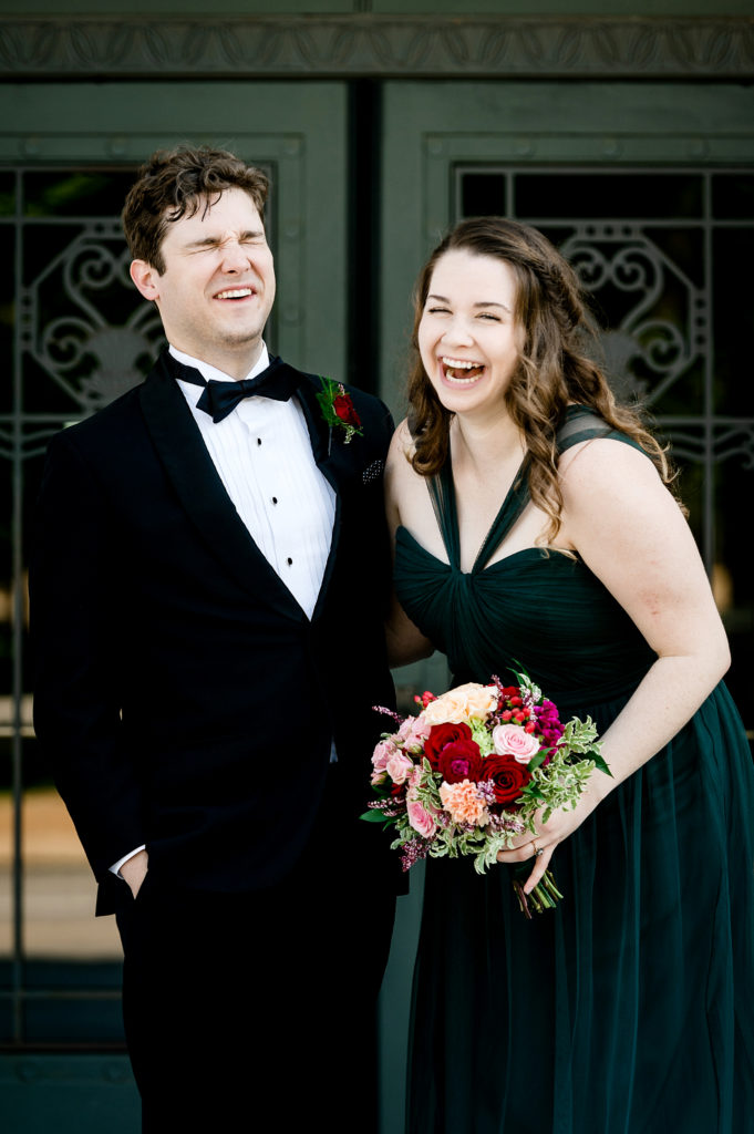 groom and his sister laughing outside stifel theater